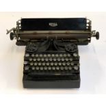 A Royal vintage typewriter with waxed canvas cover