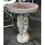 A composite stone bird bath supported on the three graces, 62x78cm