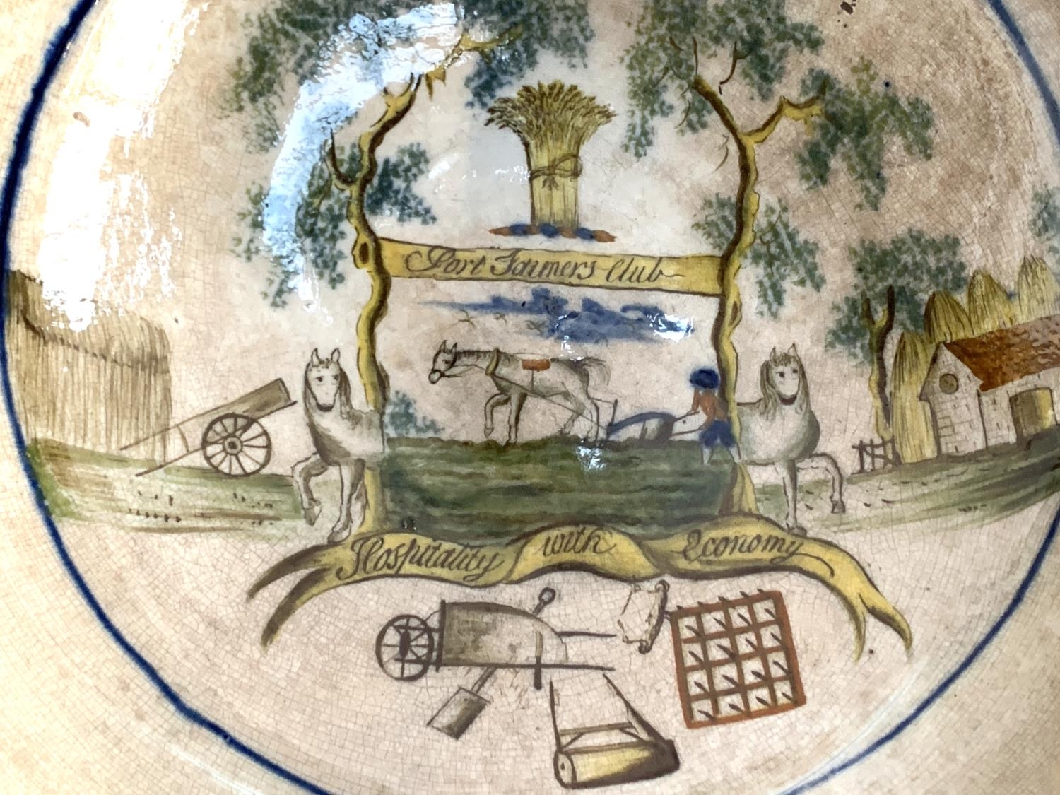 An 18th century English Delftware bowl, underglaze painted, bearing crest 'Port Farmer's Club, Hospi - Image 6 of 8