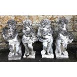 A set of four composite stone cherubs depicting the four seasons, approx. 80cmH; together with two