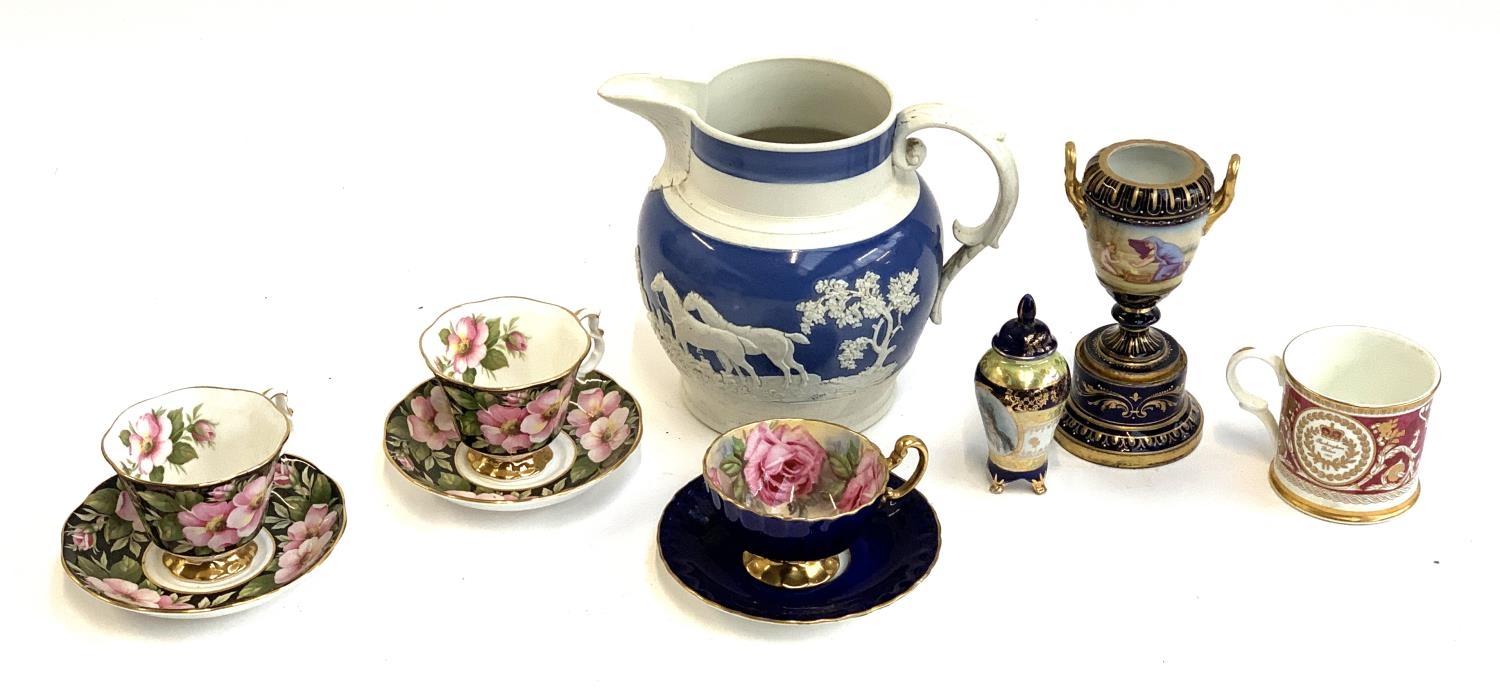 A mixed lot of ceramics to include jasperware jug, Vienna porcelain twin handled urn on pedestal,
