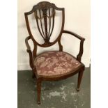 An Edwardian marquetry shield back occasional chair