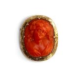 A Victorian yellow metal mounted coral cameo necklace clasp of a woman (clasp tongue absent),