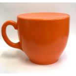 A novelty orange plastic oversized teacup stool, 40cmH