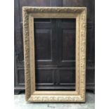 A large gilt picture frame, rebate dimensions approx. 109x63cm