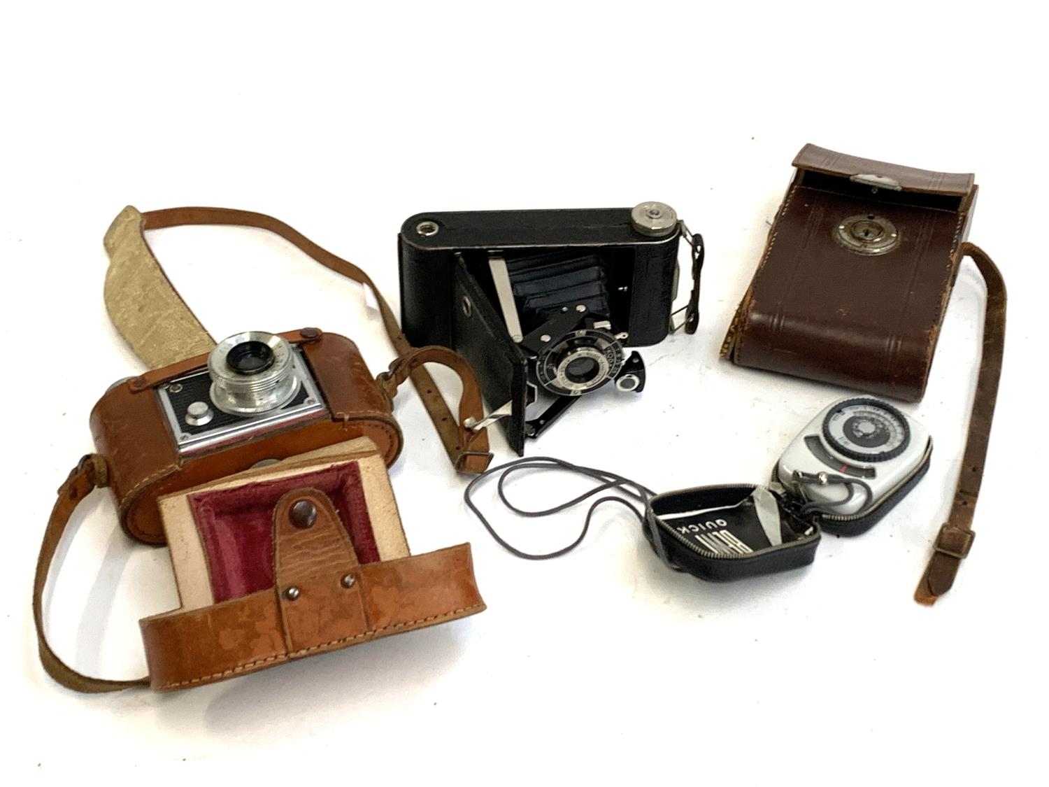 A Kodak Junior 620 bellows camera, Finetta 88 Saraber Goslav 1:2.8/45mm camera and a Bewi quick