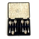 A cased set of six silver teaspoons with sugar tongs by Barker Brothers, Chester 1916, 2.7ozt