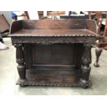 A Victorian sideboard, three quarter gallery, carved frieze with turned supports and undershelf,