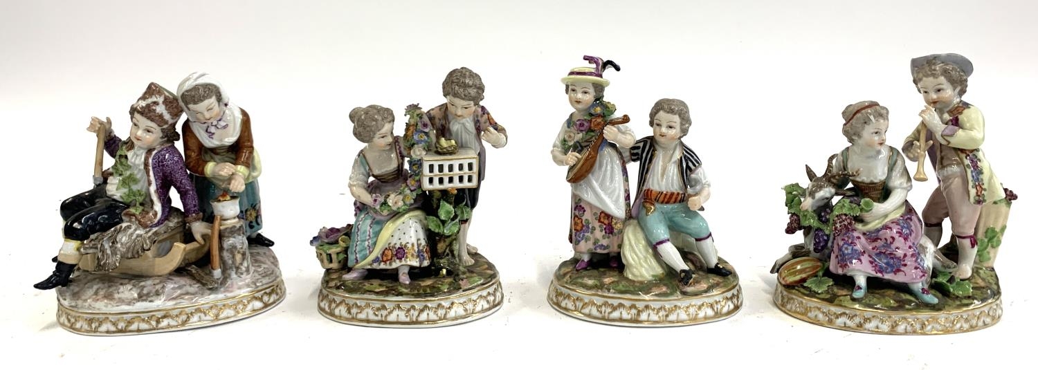 A lot of four Continental porcelain figures, each marked to base with blue crown and 'D', possibly