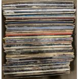 A mixed lot of vinyl LPs to include Queen, Paul McCartney; Four Tops; Bob Dylan; Alice Cooper; Simon