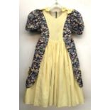 A girls cotton party dress with bows