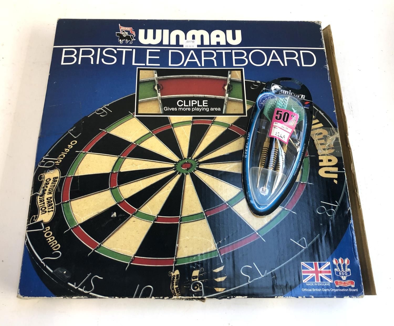 A Winmau bristle dart board, boxed, together with a set of Unicorn darts and a pair of goalkeeping