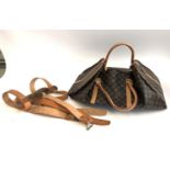 A 1950s leather blanket carrier, together with a continental weekend bag with shoulder strap