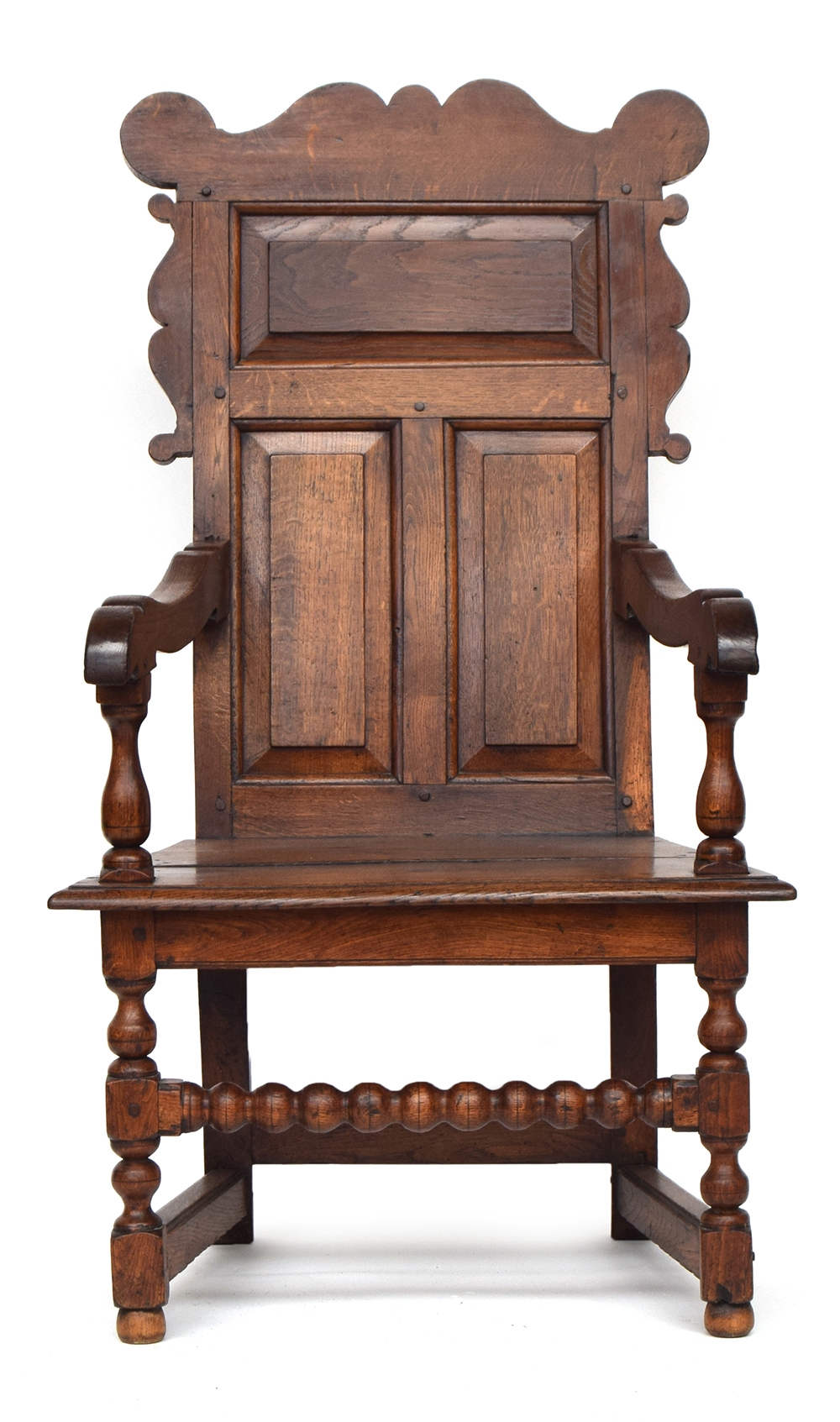 An 18th century oak wainscot chair, shaped cresting rail, over a panelled back, turned uprights - Image 2 of 2