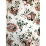 A pair of chintz curtains in a probably Colefax and Fowler cherry basket pattern, lined and