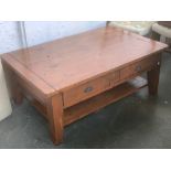 A modern coffee table, drawers to either side, 127x81x50cmH