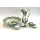 A ceramic washbowl, jug, soap dish, shaving dish, etc