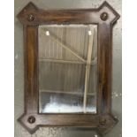 A 20th century geometric oak framed mirror, with bevelled glass, 90x70cm