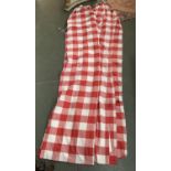 A pair of red check curtains, each approx. 250cm drop, 200cm width