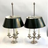A pair of silver plated three arm table lamps with green enamelled shades, adjustable height, 72cmH