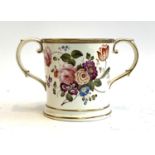 An unusually large Victorian twin handled oversize floral mug, heightened in gilt, 17cmH