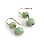 A pair of gold and celadon jade bead drop earrings, tests as 14ct or higher, 3cmL