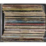 A mixed lot of vinyl lps to include Bob Dylan, Genesis, John Lennon; Rod Stewart; Fleetwood Mac;