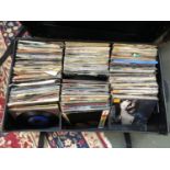 A large box of 7" singles to include Earth Wind & Fire, Peggy Lee, Bucks Fizz, Isotonik, Stevie