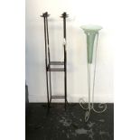 A wrought iron floor standing candle holder, 106cmH, together with a wrought metal and glass vase