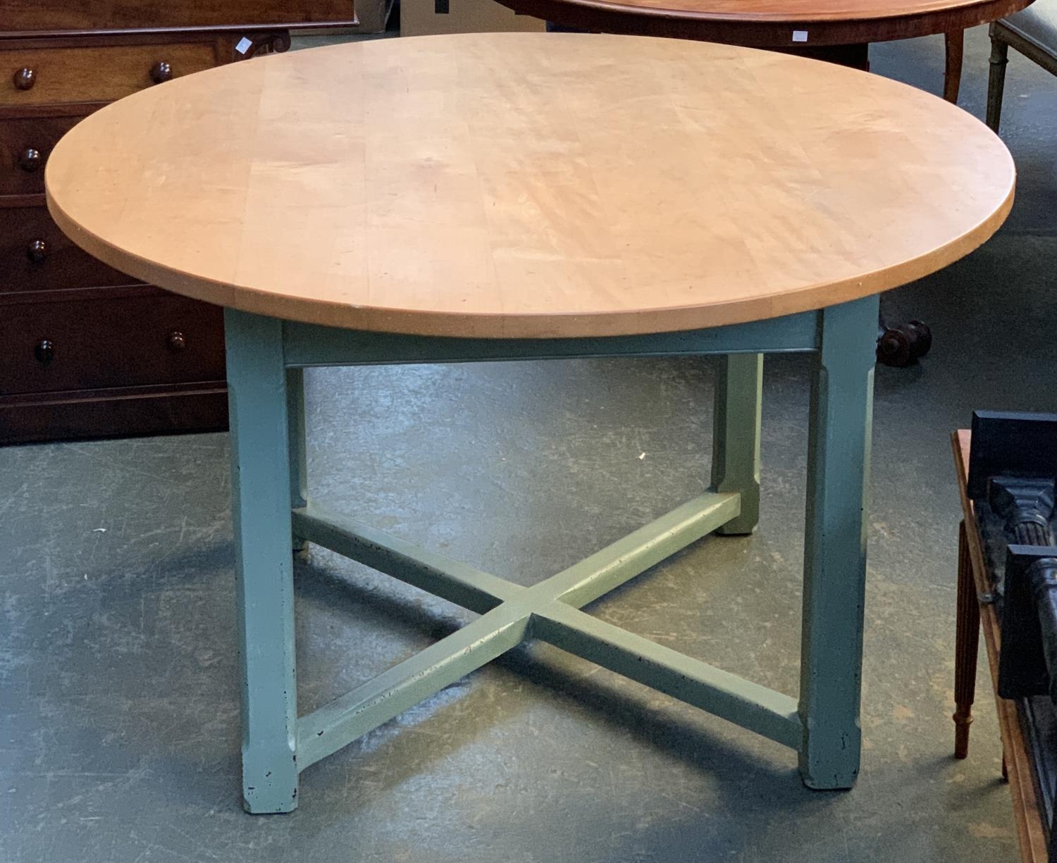 A contemporary French Chalon circular kitchen table, sycamore top with green painted base with cross