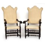 A pair of 19th century Renaissance revival throne chairs, upholstered shaped backs, carved outward