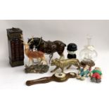 A mixed lot to include a Beswick stag, shire horse, Bisto NSPCC cloth dolls, vintage Homepride