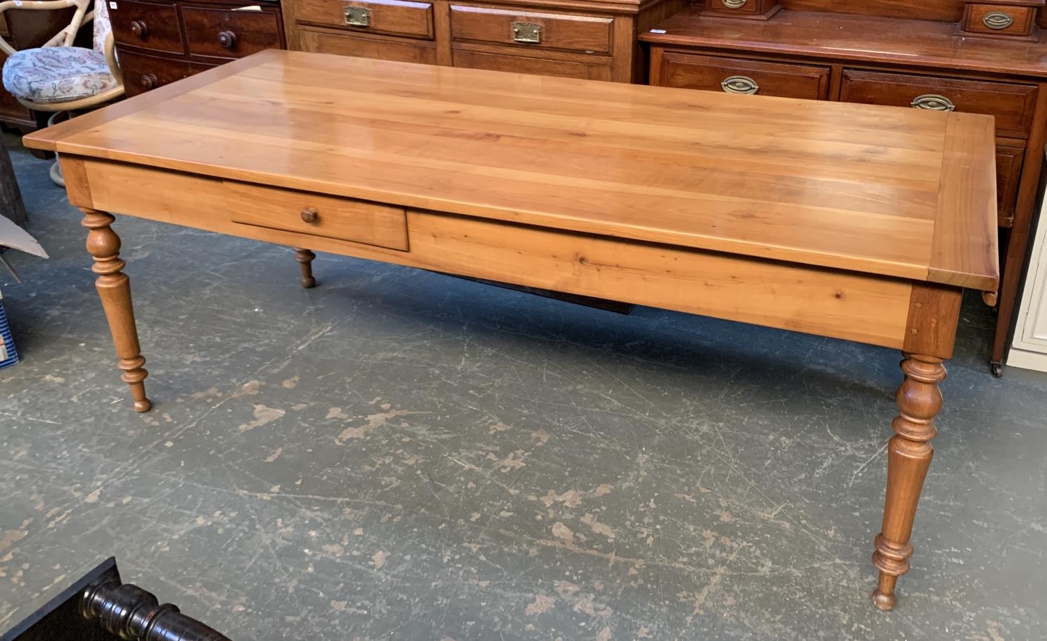 A French fruitwood farmhouse kitchen table, with bread slide, 195x85x73cmH