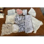 A quantity of table linen and lace, to include Madeira lace