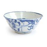 A Chinese blue and white bowl with abstract patterns, four character marks to base 'Jingde Guyao' (