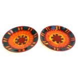 A pair of Poole Pottery Volcano no. 54 dishes, 40cmD