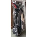 A Mizuno golf bag, containing eight Northwestern golf clubs, and two Ram golf clubs