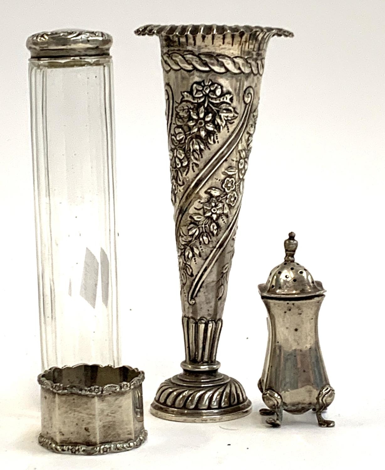 A loaded chased silver spill vase, William Comyns & Sons, London 1901, 16.5cm high; together with