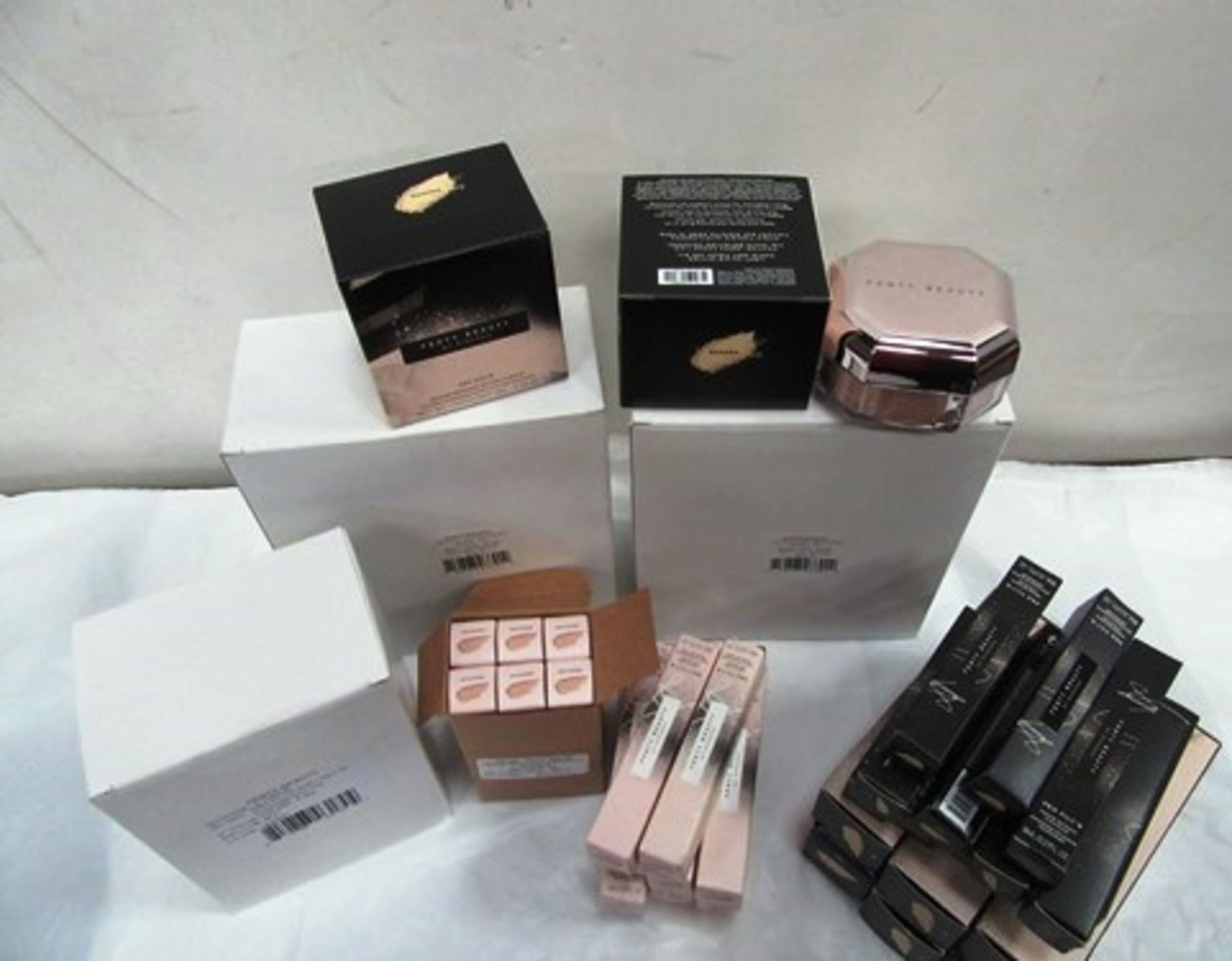 A selection of Fenty Beauty cosmetics to include 12 x 28g pots of Banana setting powder, eye primer, - Image 2 of 2