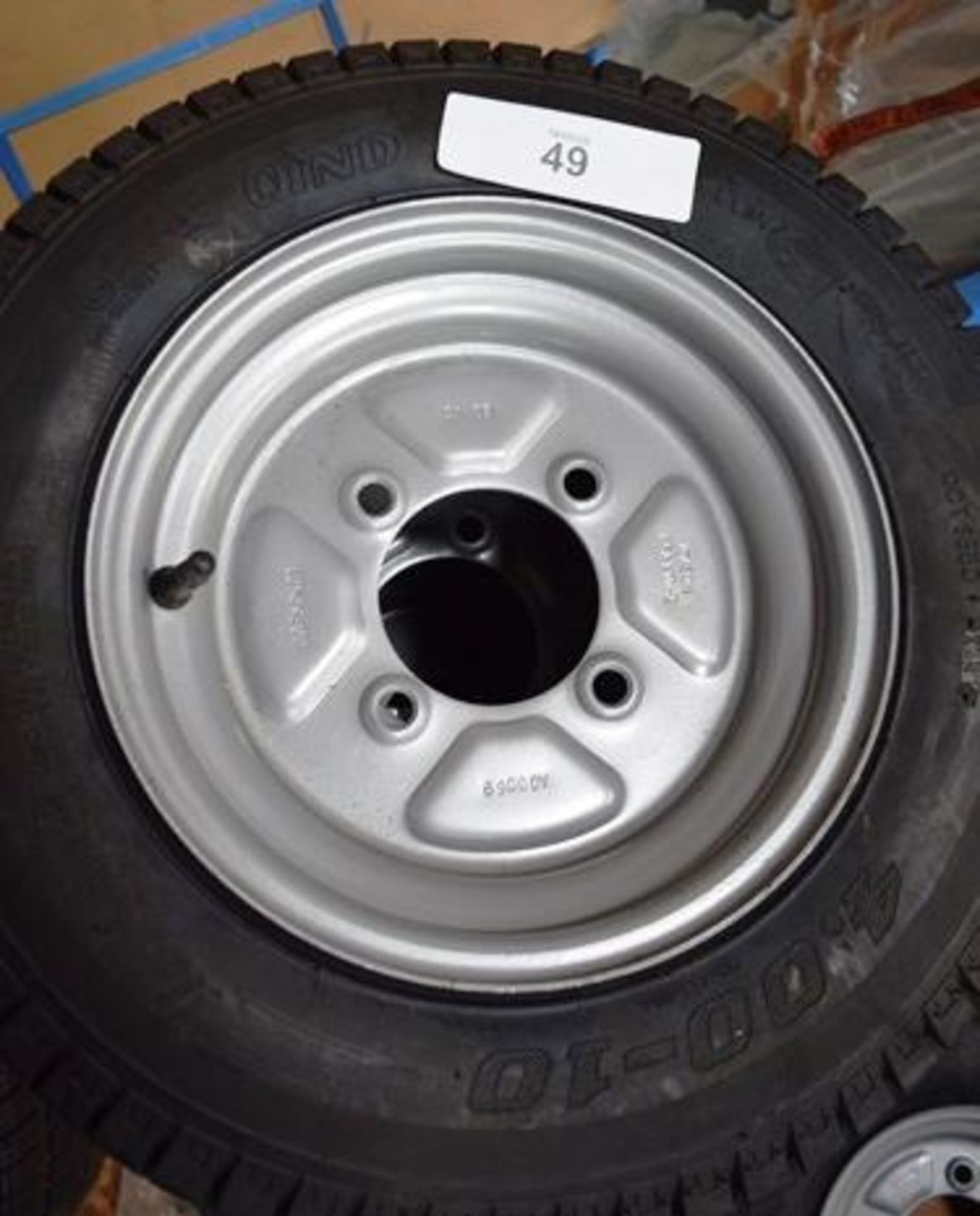 3 x Qind tyres, size 4.00 x 10" with fitted metal 4 stud hubs and 1 x Wanda 4 tyre, size 4.80/4.00-8