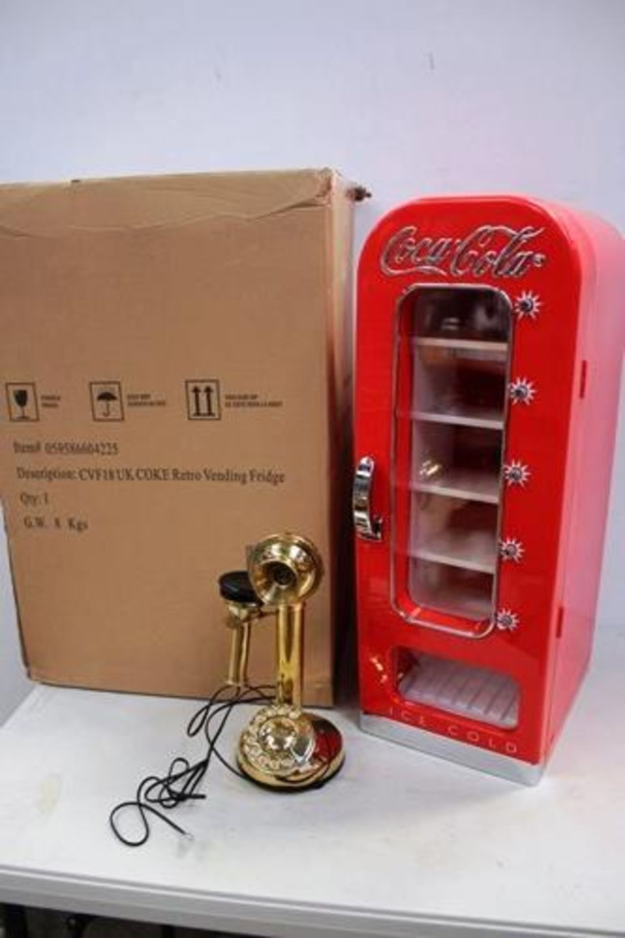 1 x retro style Coca-Cola can chiller, model CVF18, together with 1 x gold colour retro