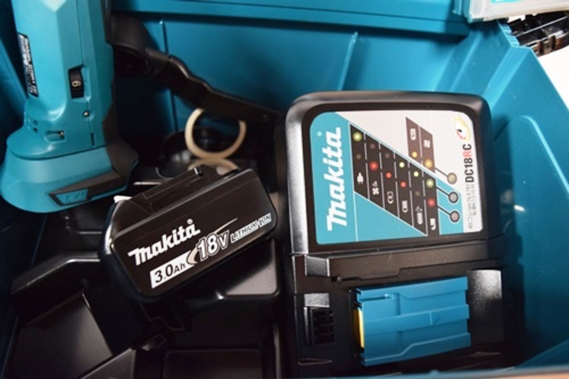 1 x Makita 18V cordless angel grinder, model DTM51, together with 1 x Makita 18V 3.0ah battery, 1 - Image 2 of 4