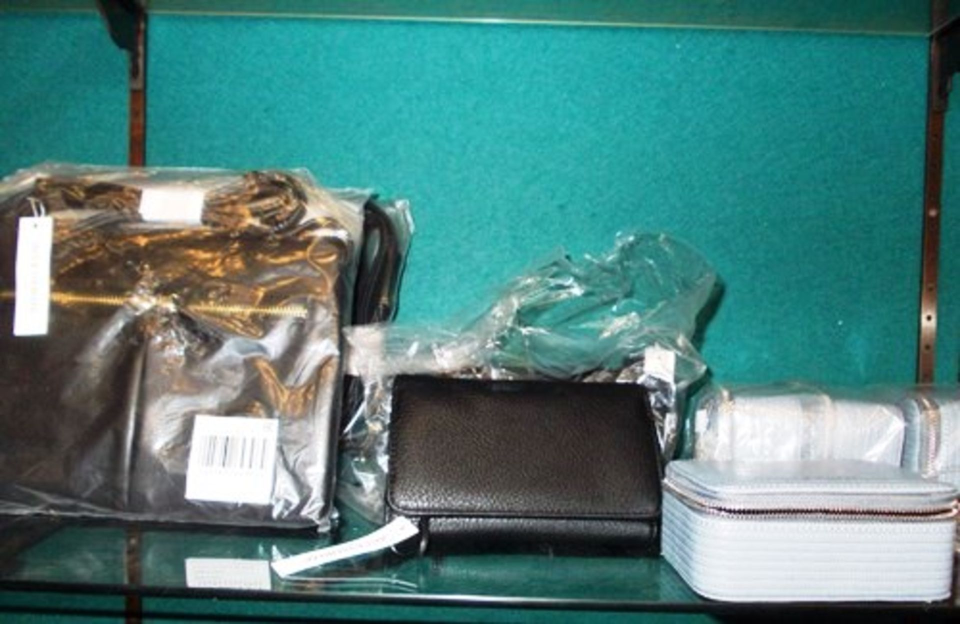 A quantity of Accessorize products comprising 4 x small jewellery cases, 5 x purses and 5 x