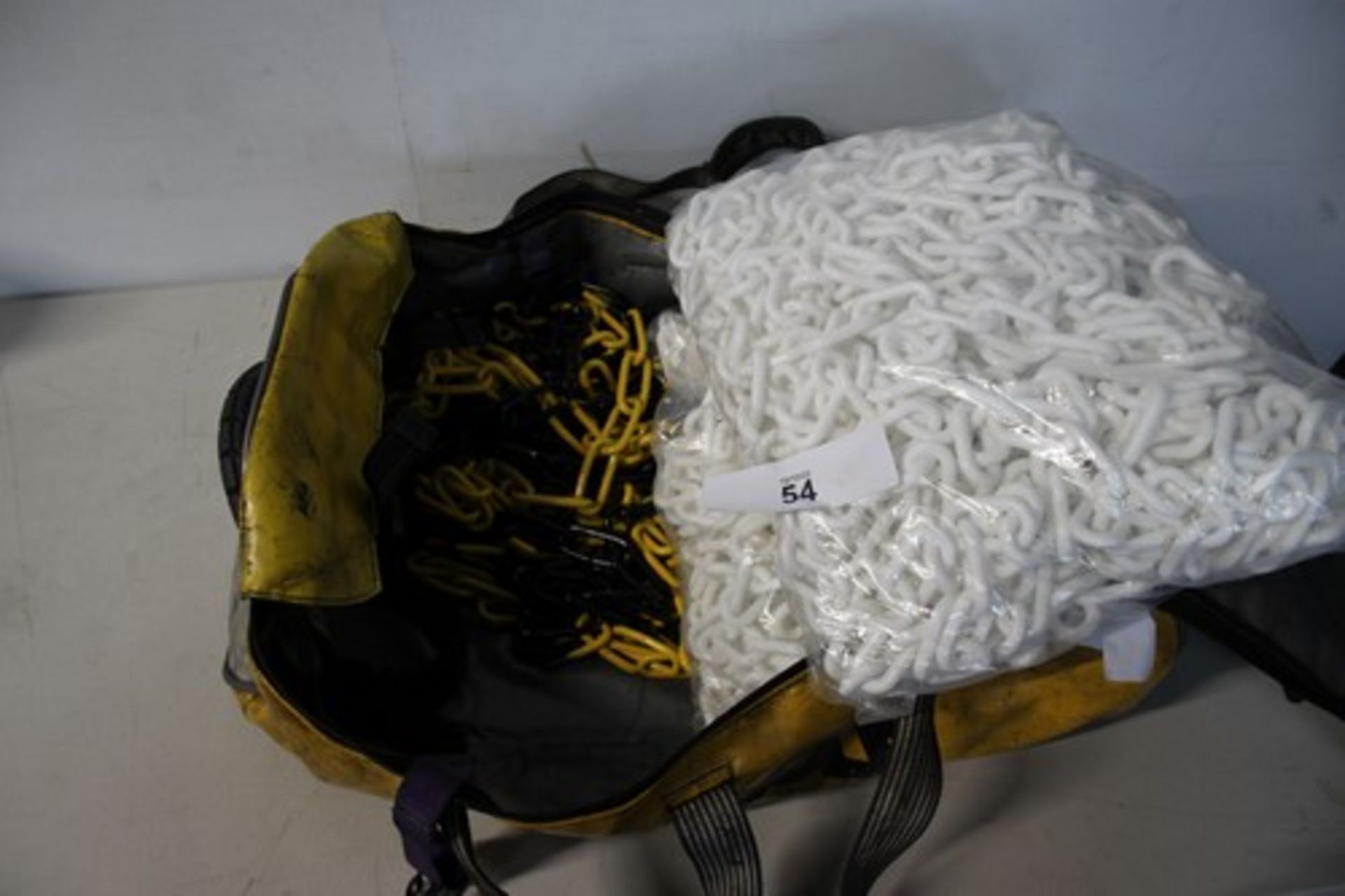 1 x 15m length of yellow and black metal chain, 2 x approximately 24m white plastic chain in Dirty
