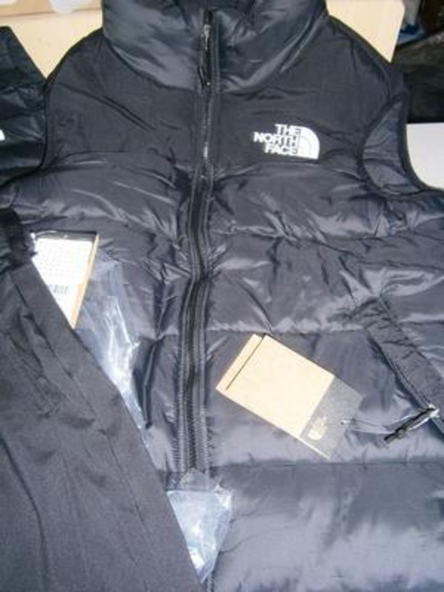 5 x items of North Face clothing comprising 2 x pairs shorts, sizes M & L, 2 x gilets, sizes S and L