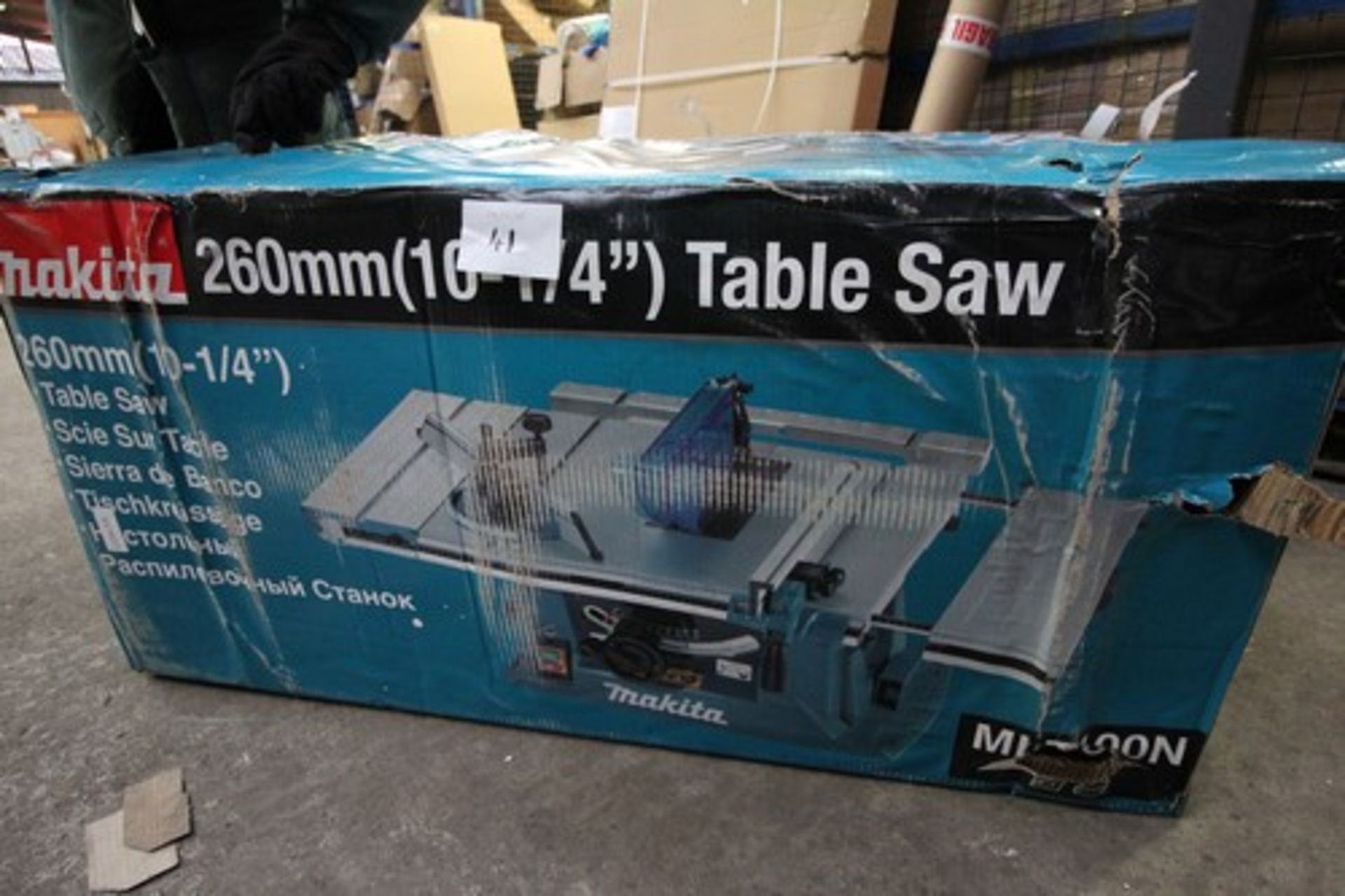 1 x Makita 260mm 10-1/4" table saw, model MLT100N - new in tatty water damaged box (ES2)