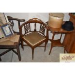 An Edwardian inlaid mahogany corner chair