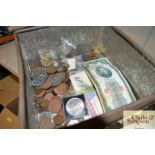 A box containing bank notes and coinage