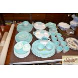 A quantity of Poole pottery twin tone dinner and t