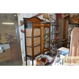 An Edwardian inlaid mahogany china display cabinet